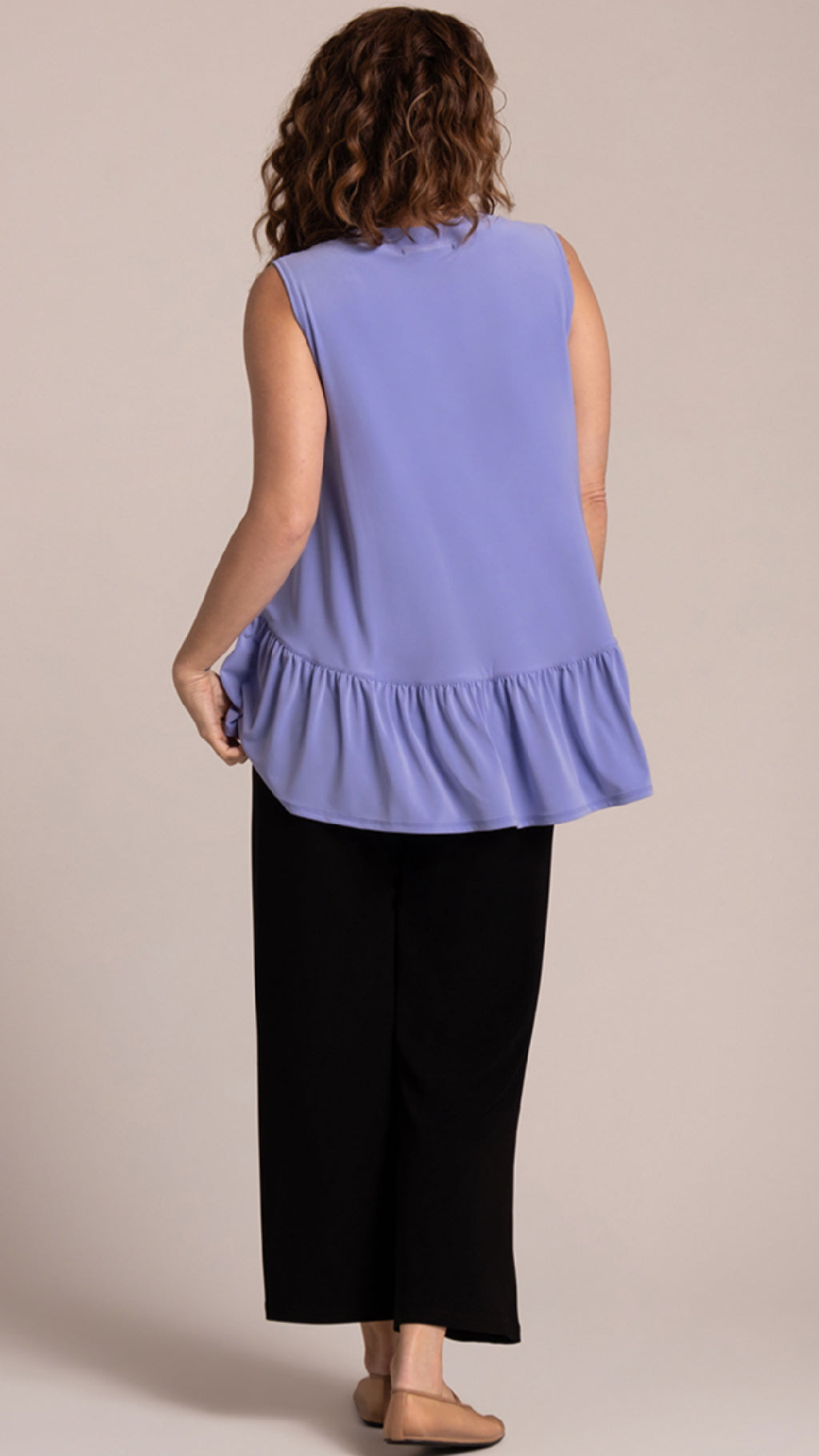 Sleeveless Flirty Peplum Top